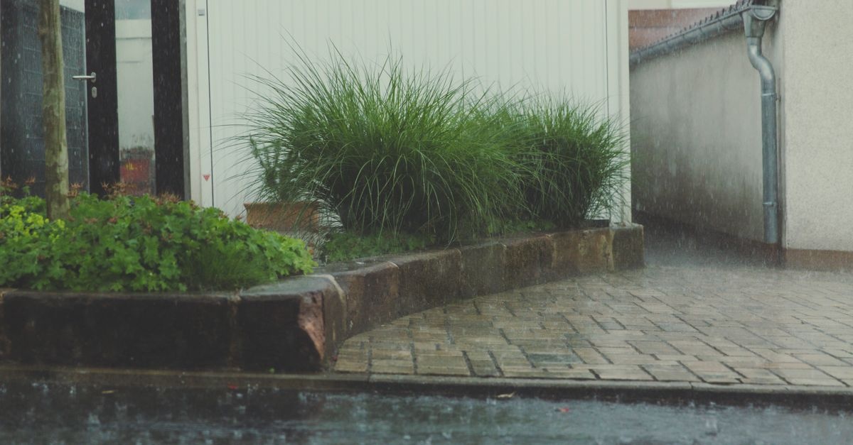 Banish Puddles for Good: Install a Linear Drain Beside Your Garage in a Weekend